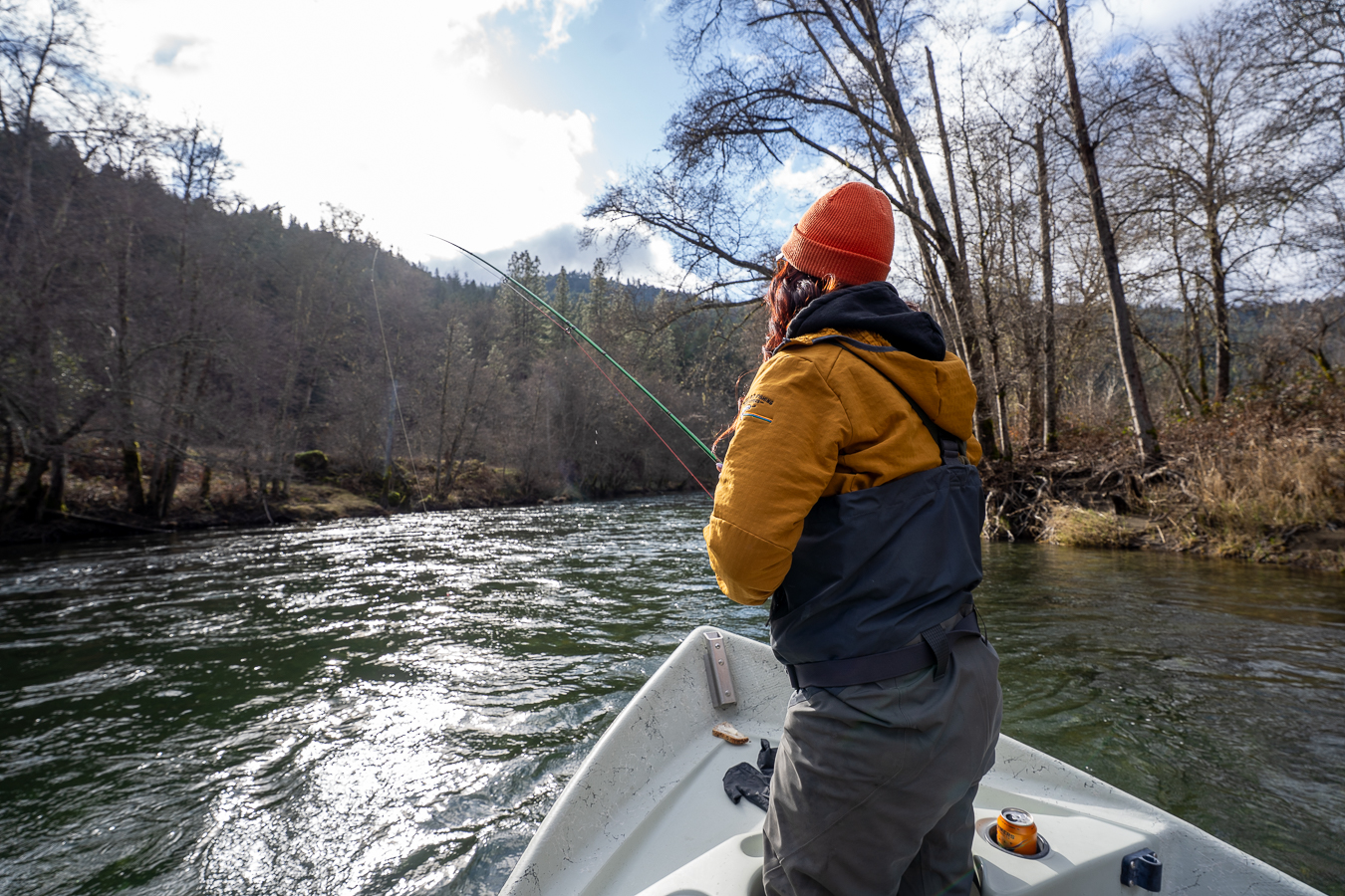 Woman fighting a fish on the Trinity River