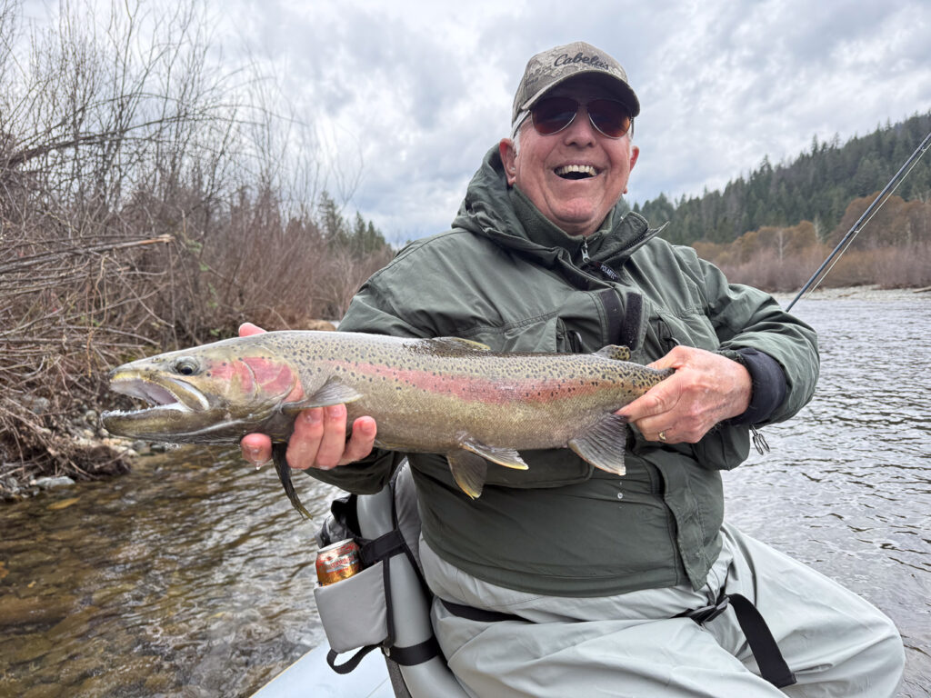 Man holding steelhead