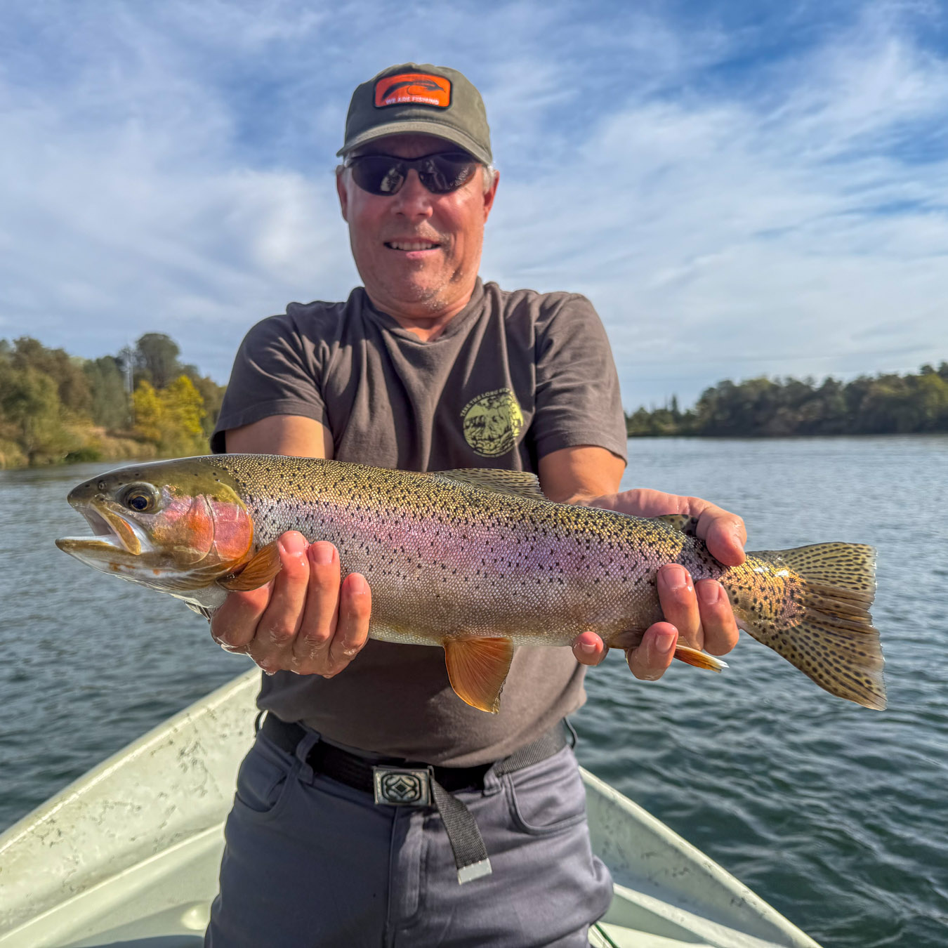 Man holding a big Lower Sacramento River Rainbow trout